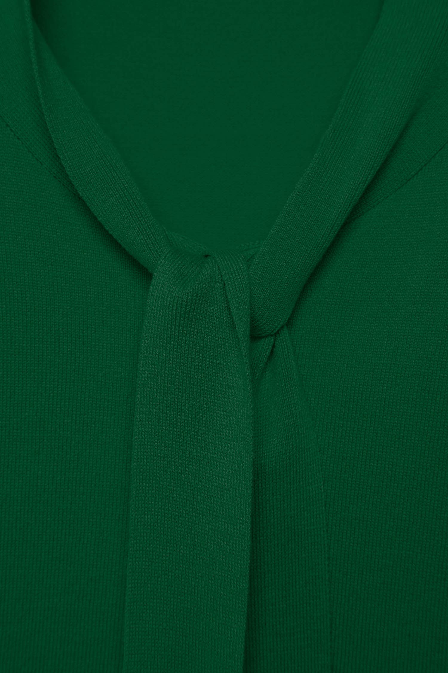 Maglione a maglia rasata con scollo a V e fiocco