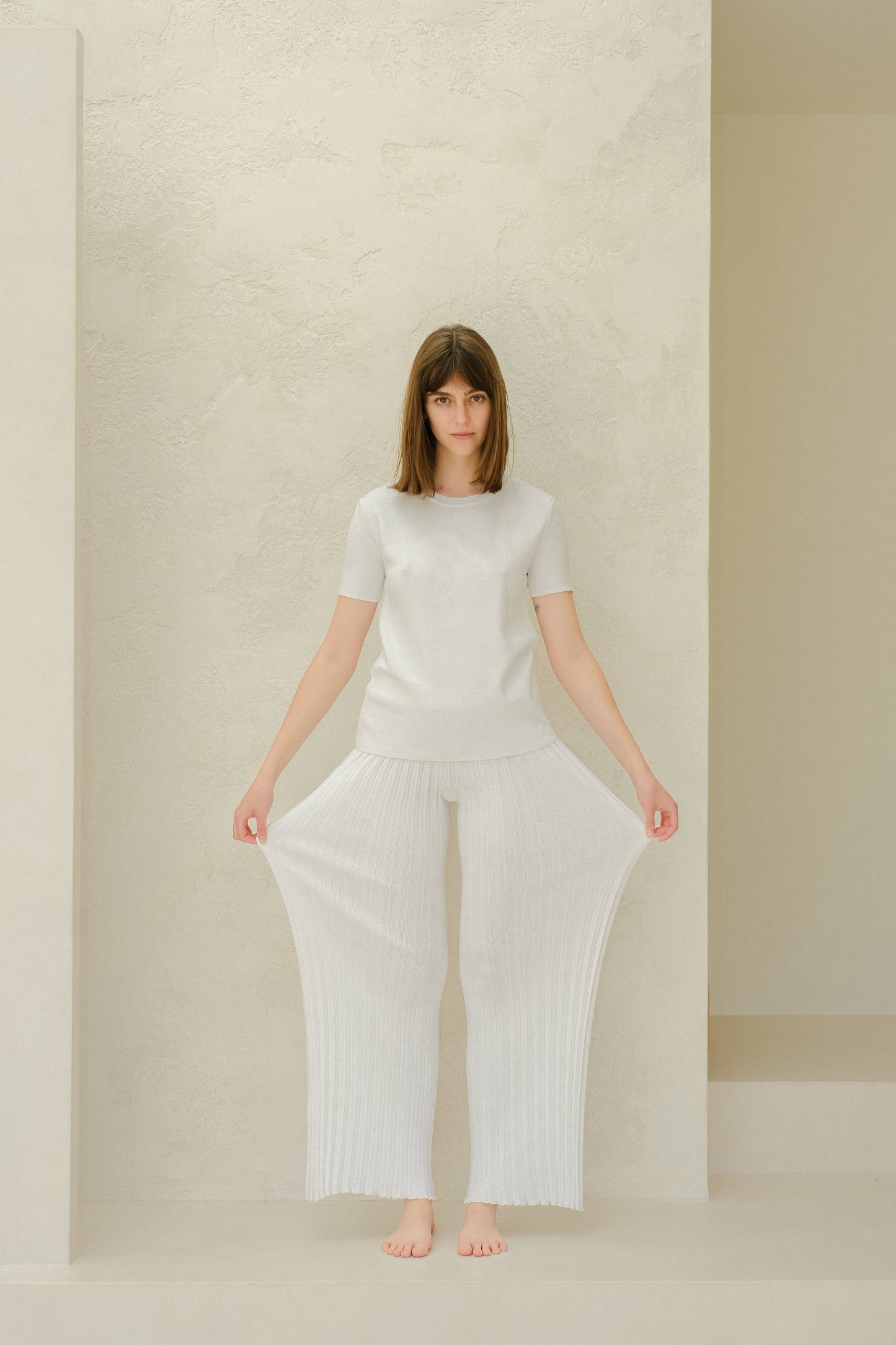 Pantaloni in cotone plissé fine in maglia 3D