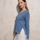 Maglione in maglia lurex con scollo a V
