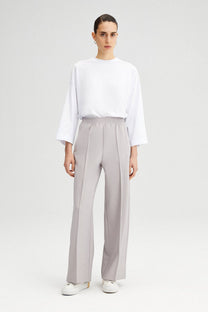 Pantaloni a vita alta in crepe elasticizzato a gamba larga