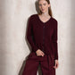 Maglione in maglia scintillante con profilo ondulato