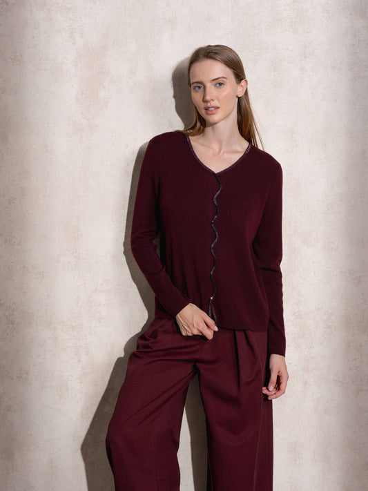 Maglione in maglia scintillante con profilo ondulato