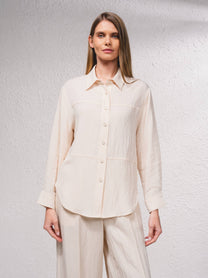 Camicetta oversize con bottoni frontali e colletto classico