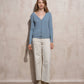 Cardigan in maglia con bottoni dorati