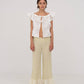 Top bianco Lux con volant e ricami