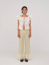 Top bianco Lux con volant e ricami