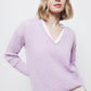 Maglione in maglia strutturata con scollo a V