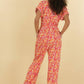 Tuta jumpsuit Clementine con stampa tropicale