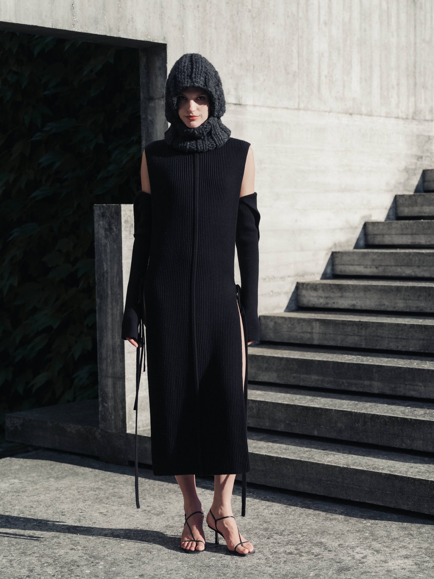 Scaldabraccia in lana merino extra fine con fasce lunghe