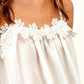 Top bianco in pizzo con spalline sottili