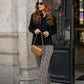 Pantaloni in maglia animalier a gamba ampia