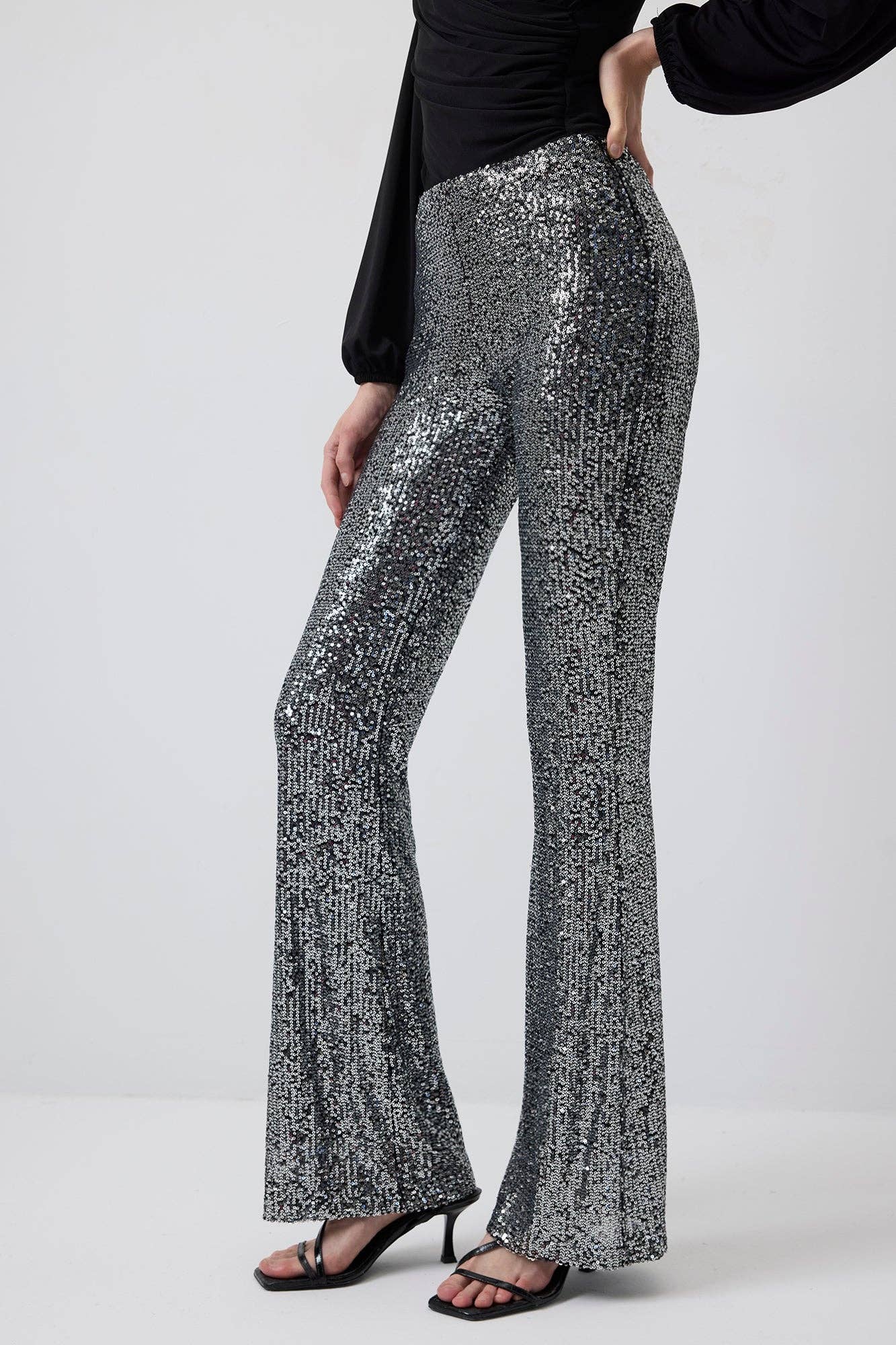 Pantaloni a zampa con paillettes