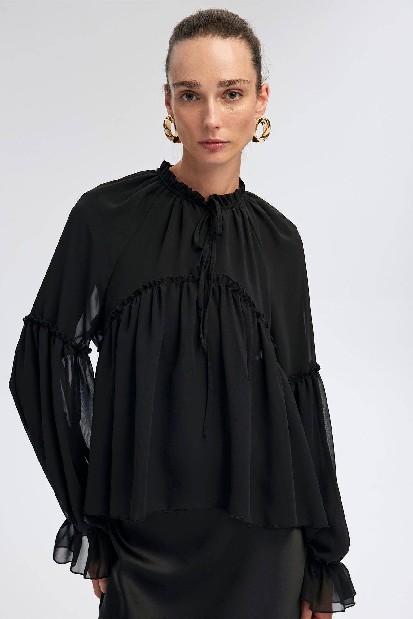 Camicetta in chiffon con balze