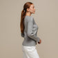 Maglione donna laminato a costine con scollo a V