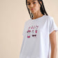T-shirt bianca con stampa e balza