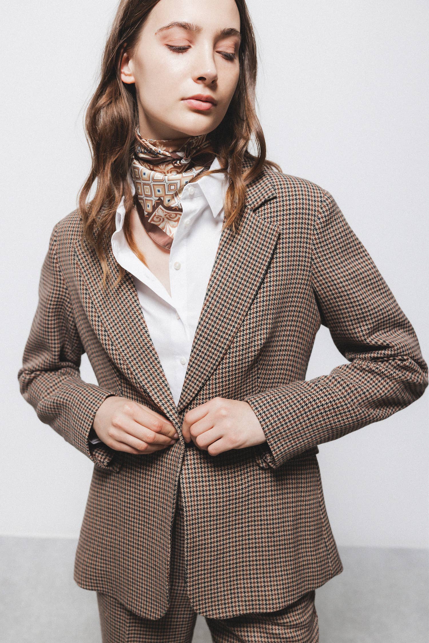 Blazer pied de poule con chiusura a bottone