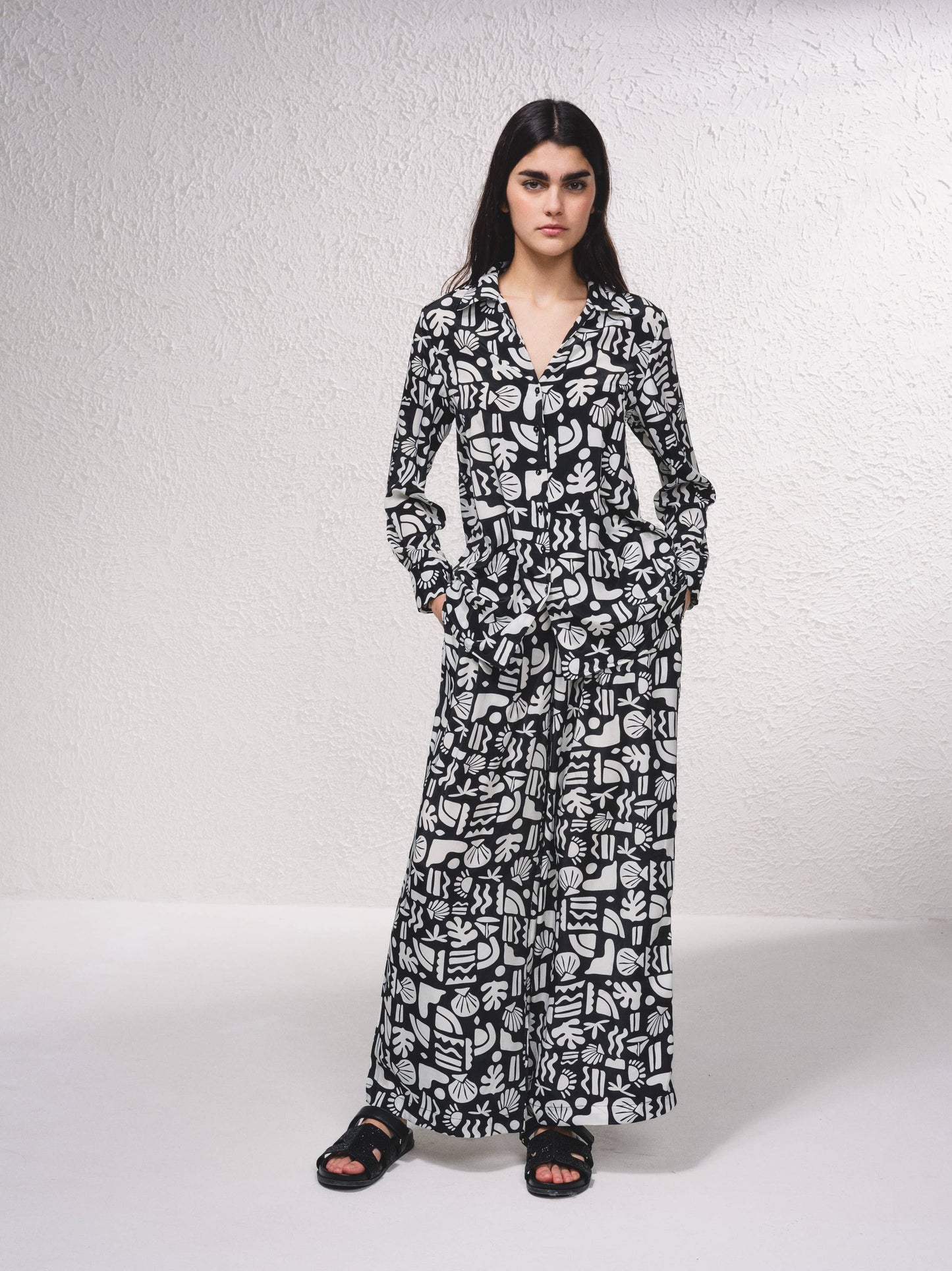 Pantaloni satinati a vita alta con stampa