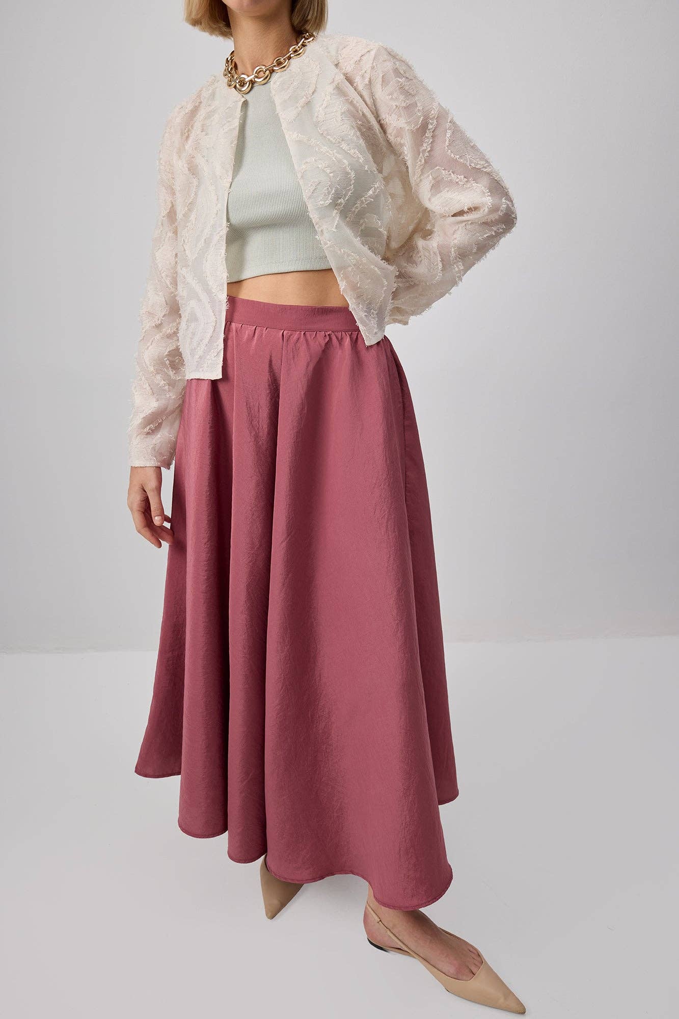 Gonna lunga svasata rosa con tasche
