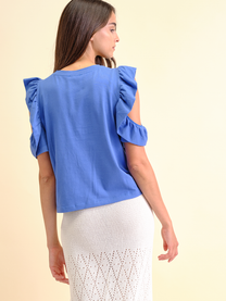 T-shirt con volant “Good Things Are Coming”