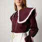 Camicia bordeaux con maxi colletto a contrasto e volant