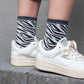 Calze zebra glitterate in cotone pettinato bianco e nero