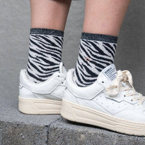 Calze zebra glitterate in cotone pettinato bianco e nero