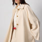 Trench corto in gabardine di cotone con maniche svasate