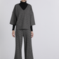 Pantaloni in maglia pied-de-poule a gamba ampia