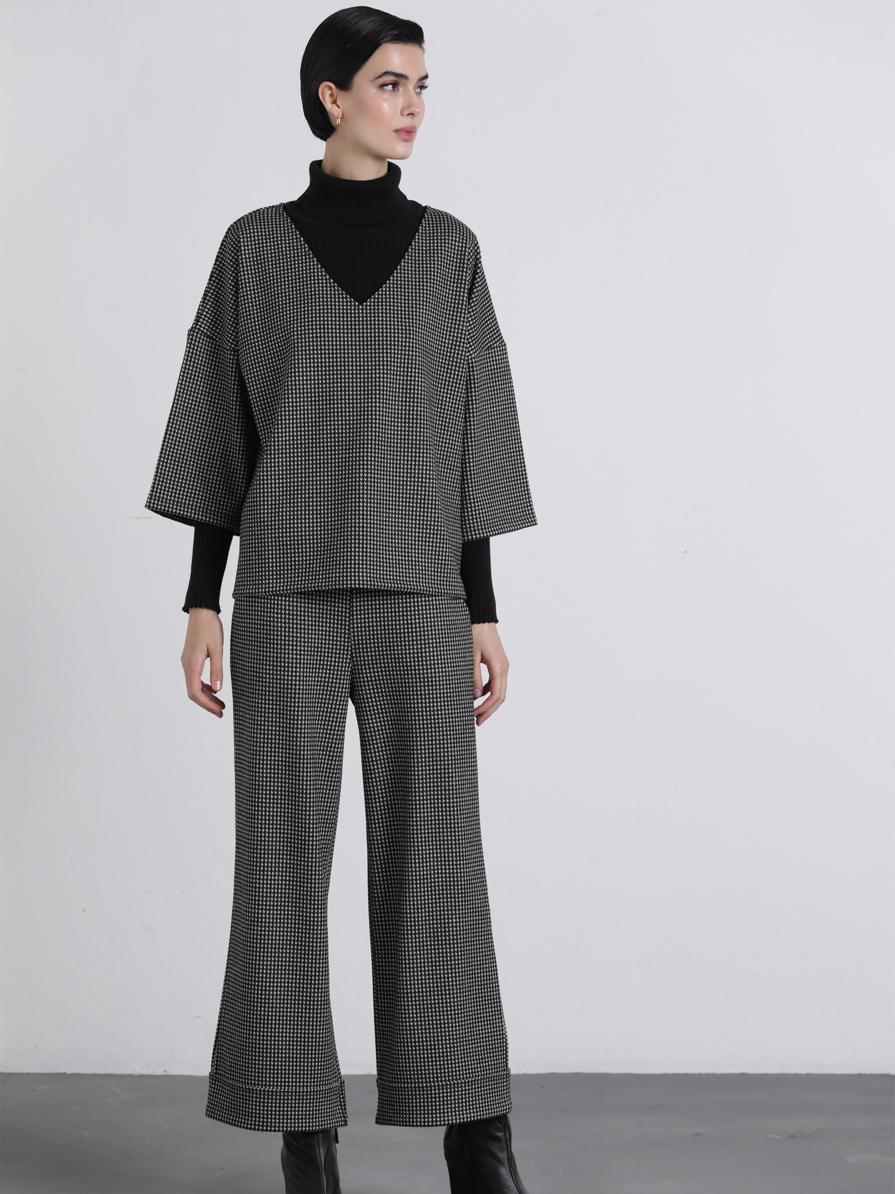 Pantaloni in maglia pied-de-poule a gamba ampia