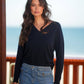 Maglia traforata con scollo a V
