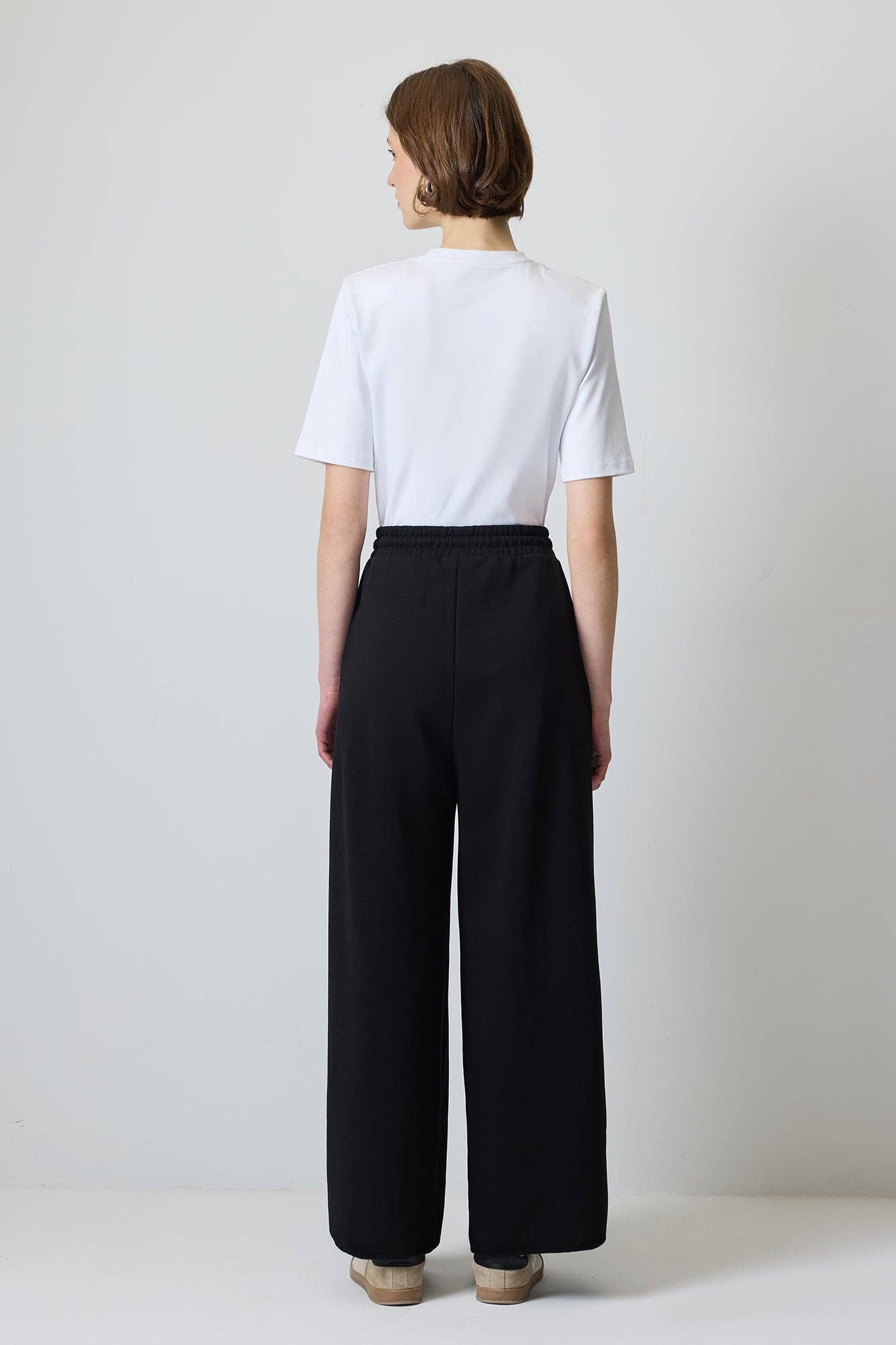 Pantaloni a palazzo con pieghe e coulisse