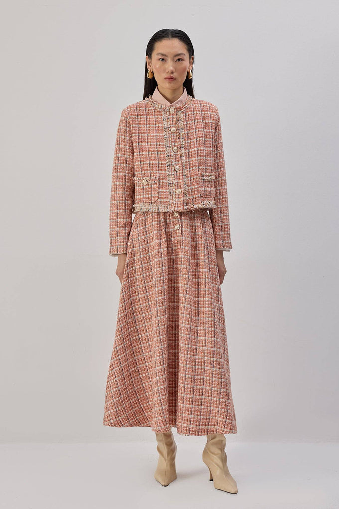 Completo in tweed con giacca corta e gonna lunga
