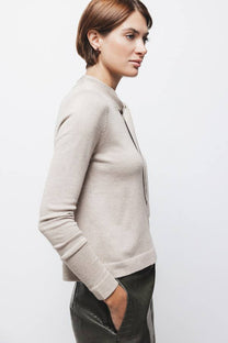 Maglione in maglia rasata con fiocco e scollo a V