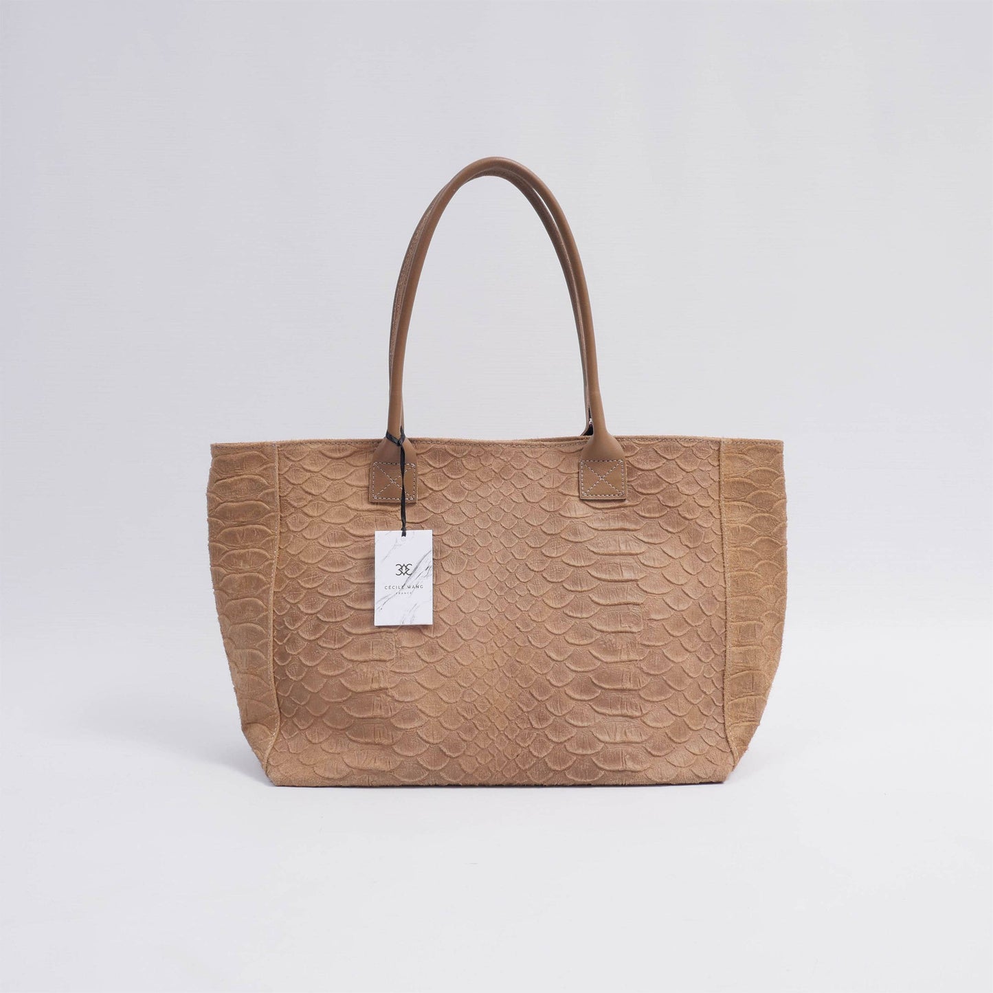 Borsa tote in pelle con texture serpente