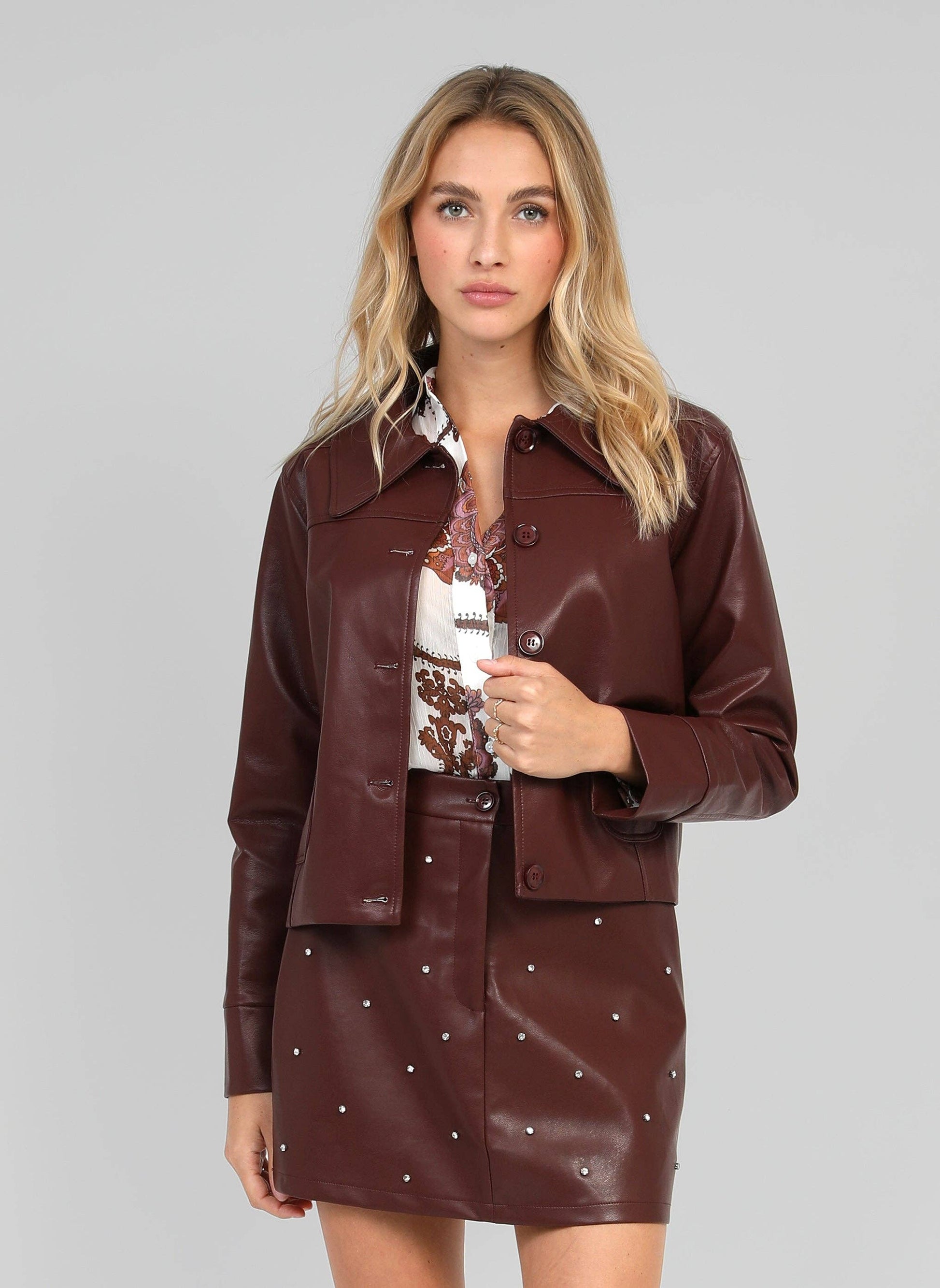 Giacca Claudiane in similpelle color vino
