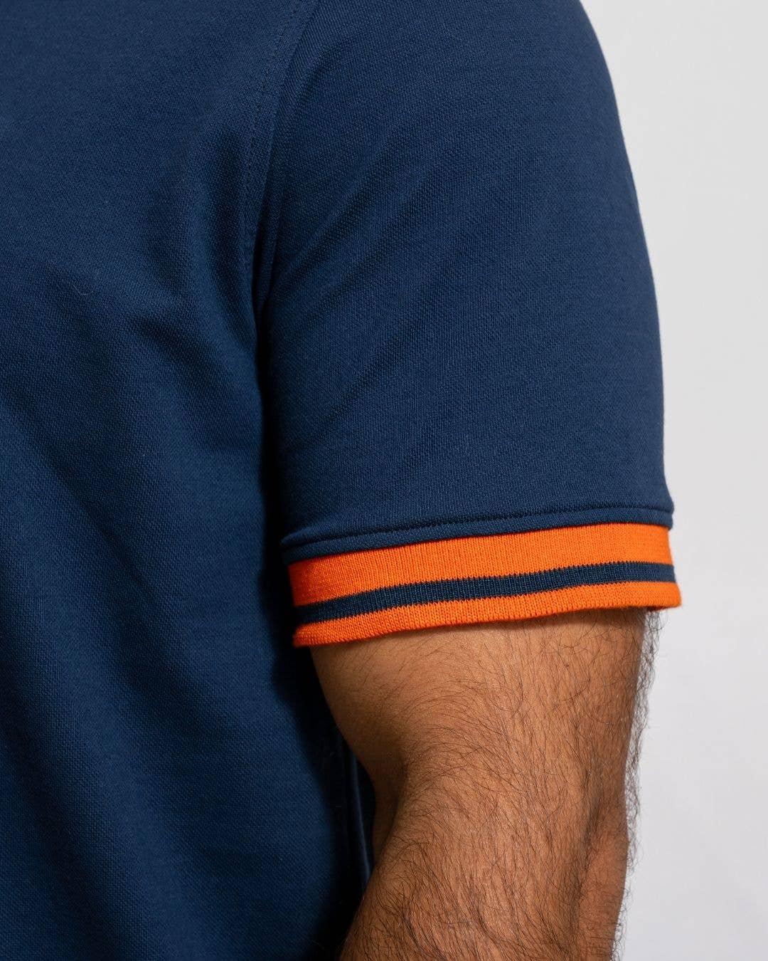 Polo uomo antimacchia bicolor in piqué