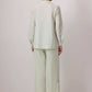 Camicia seersucker a righe con bottoni asimmetrici menta e bianco
