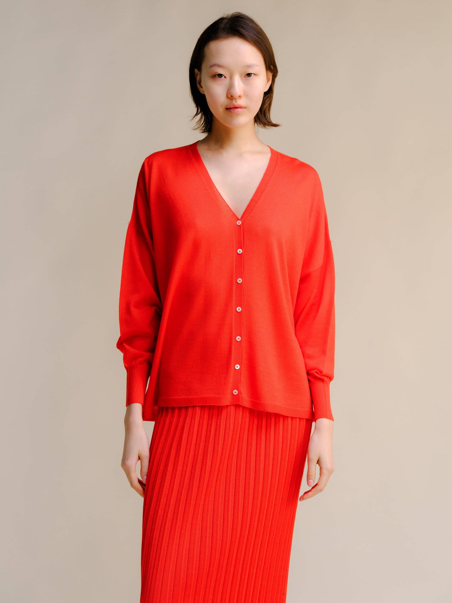 Cardigan oversize in lana merino extrafine con scollo a V