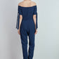 Tuta off-shoulder con bottoni dorati