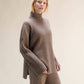 Maglione dolcevita oversize a coste in misto cashmere con spacchi laterali