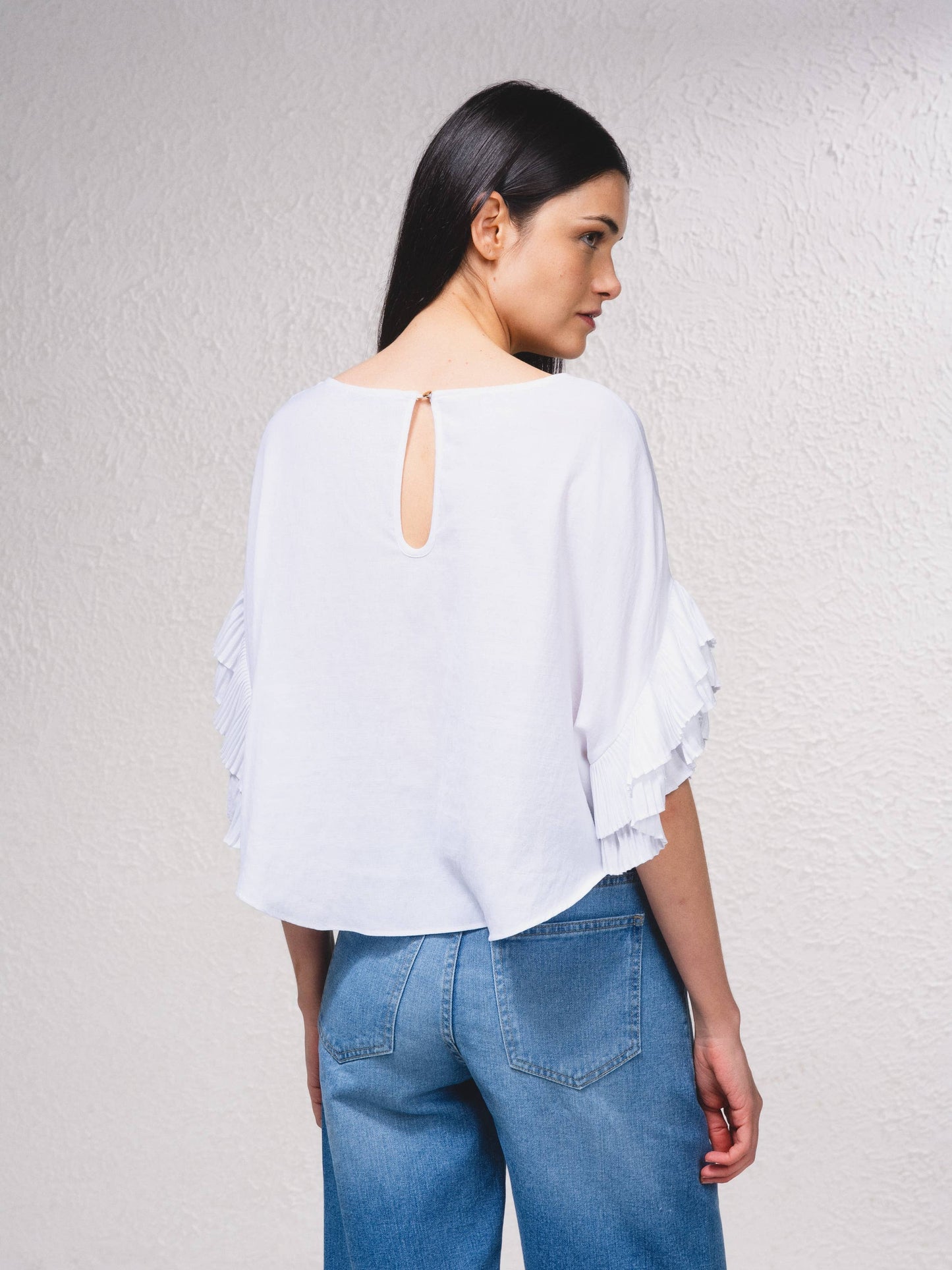 Blusa fluida con maniche a volant plissé