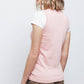Top in maglia rasata con scollo rotondo e bordi a contrasto
