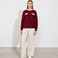 Maglione jacquard girocollo con finte tasche
