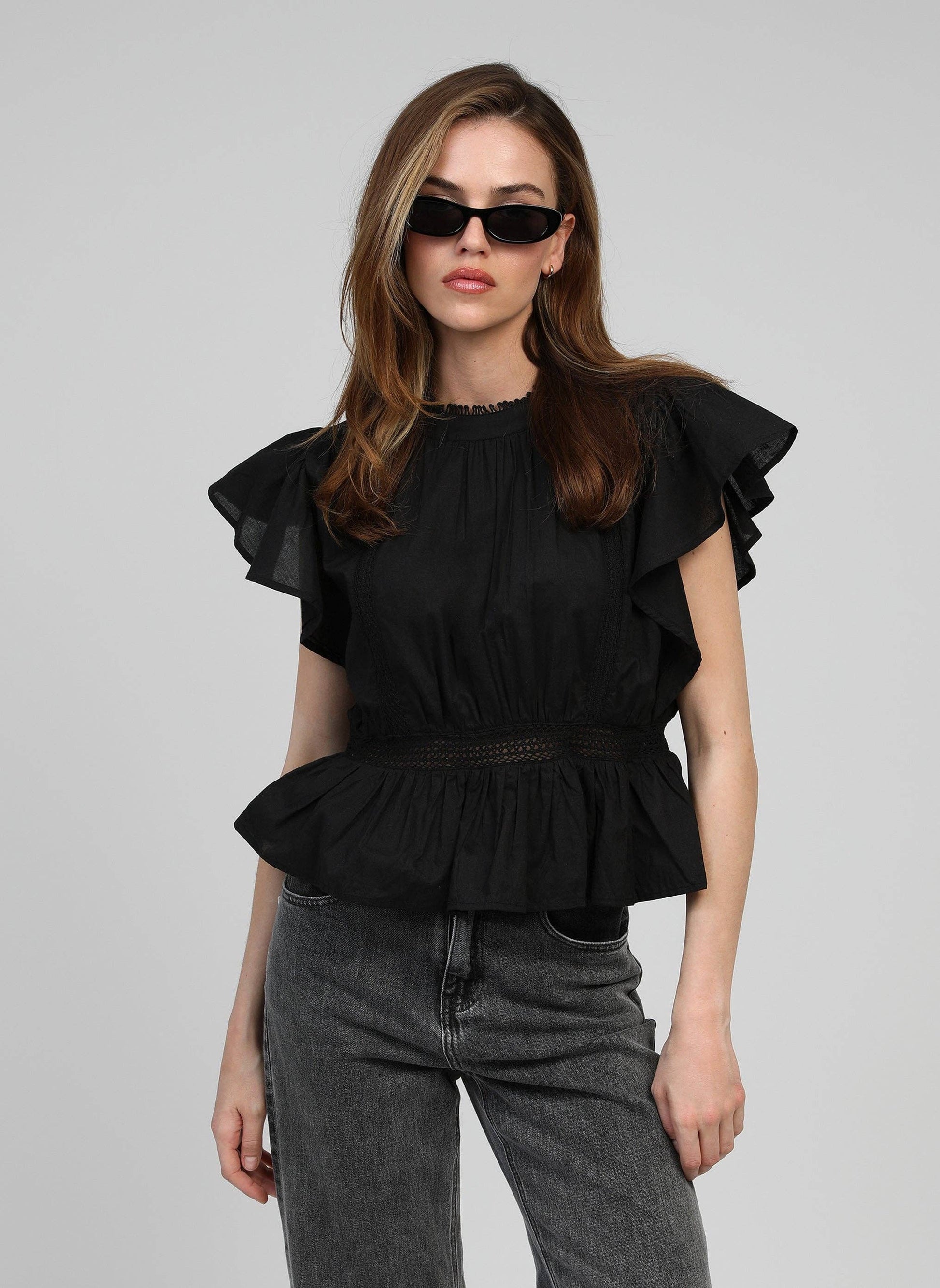 Blusa nera Salek con volant