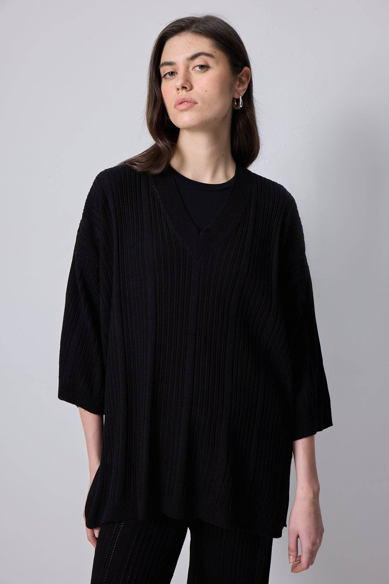 Completo in maglia nero con tunica e pantaloni