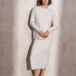 Completo in maglia scintillante due pezzi con gonna midi