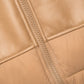 Giacca in ecopelle con cappuccio e zip