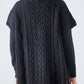Gilet in maglia a trecce con scollo a V
