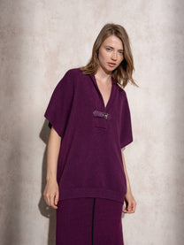 Cappa in maglia con fibbia decorativa