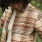 Camicia slim a quadri color latte con tasca